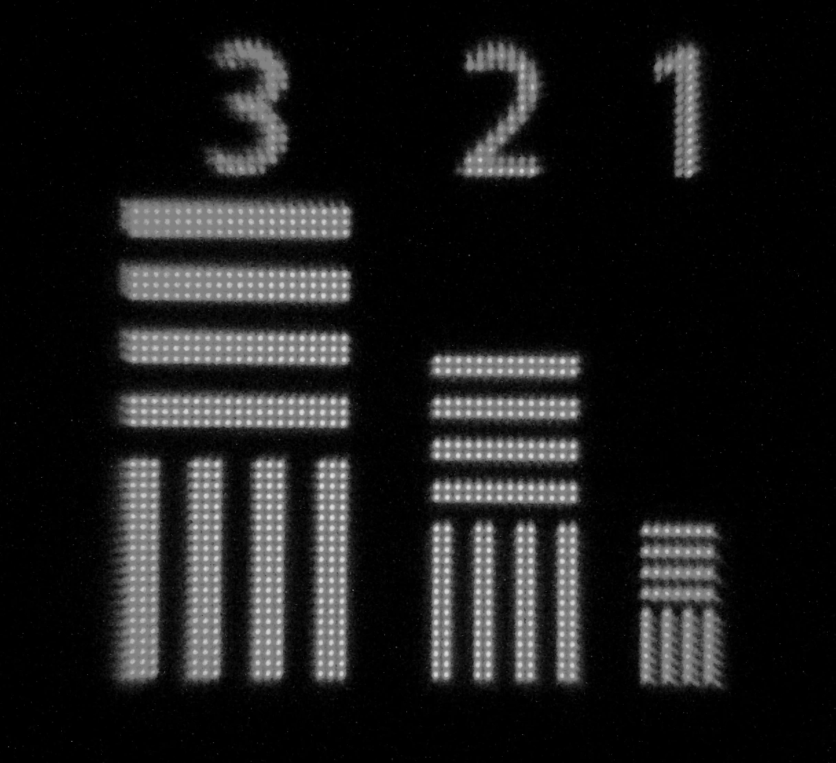Macro photo of pixels rendering fine text at 75Hz