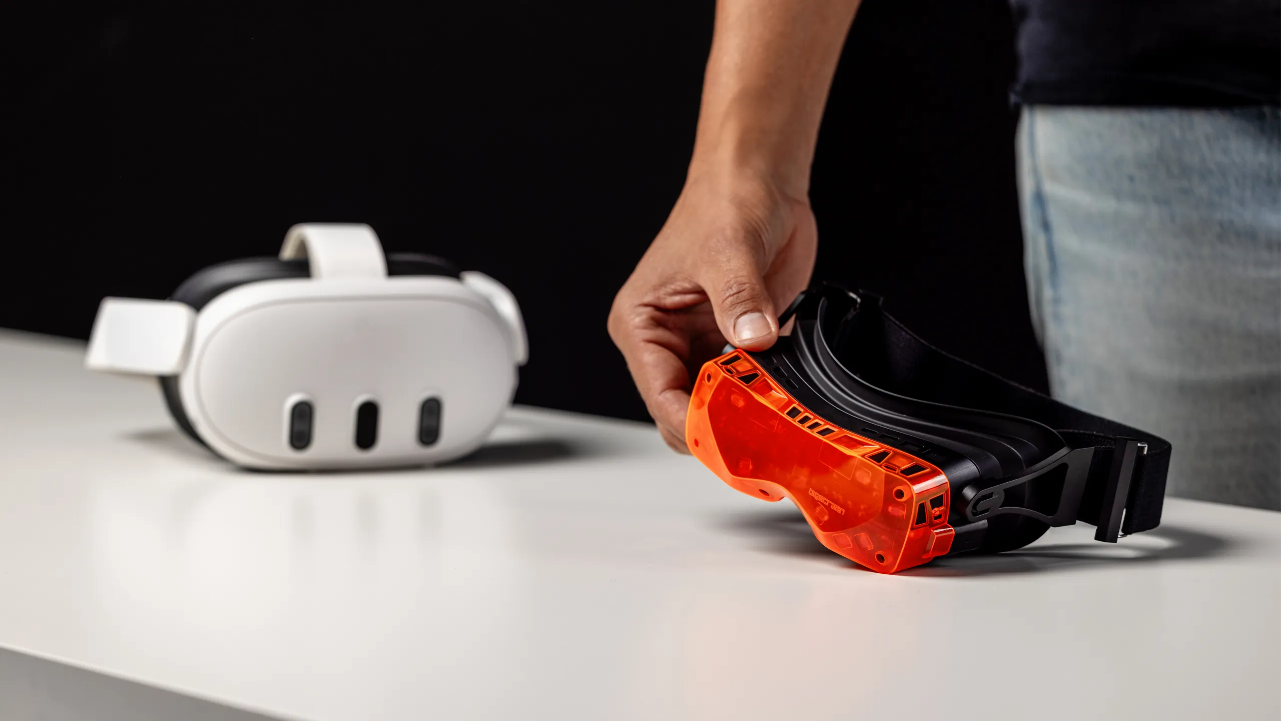 Beyond 2 next to a Valve Index for scale